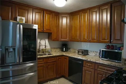 Kitchen - 1591 W Persimmon, Rialto, CA 92377 photo 1 of 2
