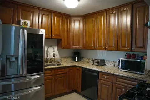 Kitchen - 1591 W Persimmon, Rialto, CA 92377 photo 1 of 2