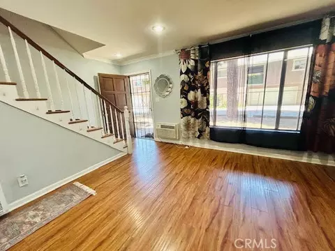 Living - 7304 Exeter St #E, Paramount, CA 90723 photo 2 of 2