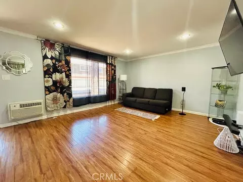Living - 7304 Exeter St #E, Paramount, CA 90723 photo 2 of 3