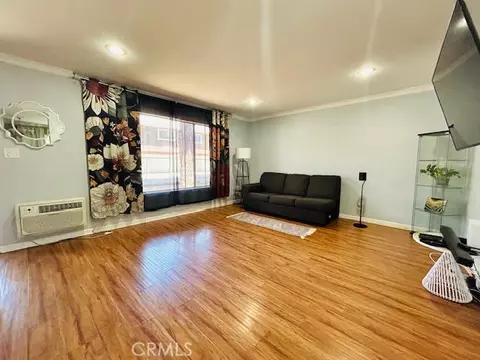 Living - 7304 Exeter St #E, Paramount, CA 90723 photo 1 of 2