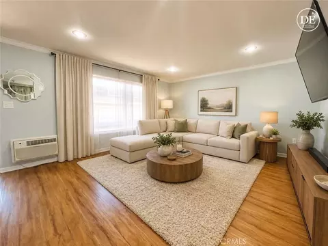 Living - 7304 Exeter St #E, Paramount, CA 90723 photo 1 of 3