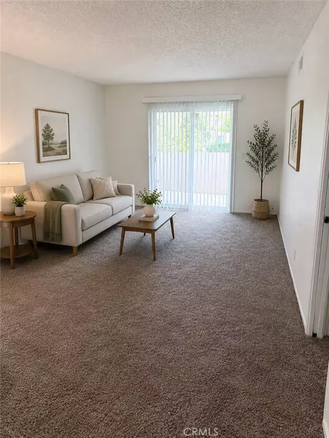 Living - 8990 19th #222, Rancho Cucamonga, CA 91701 photo 2 of 2