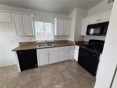 Kitchen - 7335 Lydia Ave, Riverside, CA 92504 photo 2 of 2
