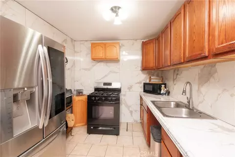Kitchen - 11430 Star St, Adelanto, CA 92301 photo 2 of 2