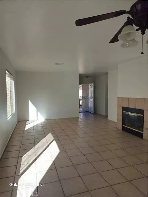 Living - 15333 Ross, Adelanto, CA 92301 photo 3 of 4