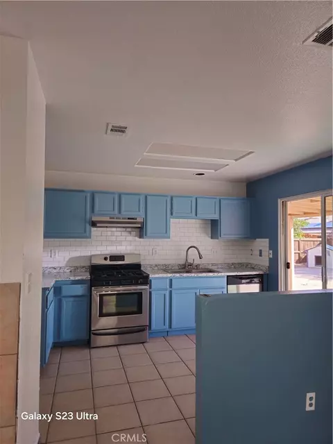 Kitchen - 15333 Ross, Adelanto, CA 92301 photo 2 of 3