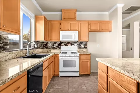 Kitchen - 2715 E Avenue J6, Lancaster, CA 93535 photo 3 of 4