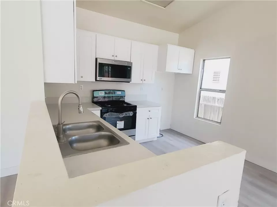 Kitchen - 10695 Plainfield St, Adelanto, CA 92301 photo 4 of 5