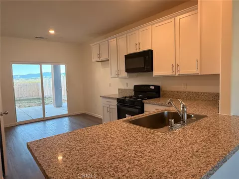 Kitchen - 1105 E Orange St, Avenal, CA 93204 photo 2 of 5