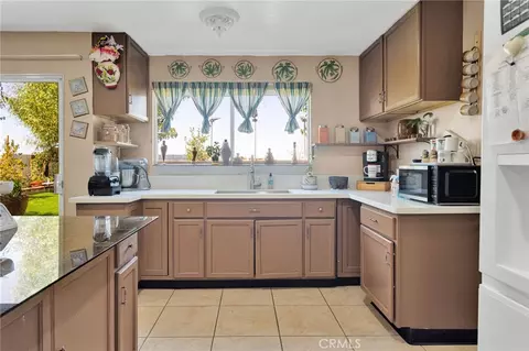 Kitchen - 10654 Alton Pl, Adelanto, CA 92301 photo 2 of 2
