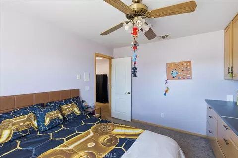 Bedroom - 10707 Mines Ranch Rd, Victorville, CA 92392 photo 5 of 9
