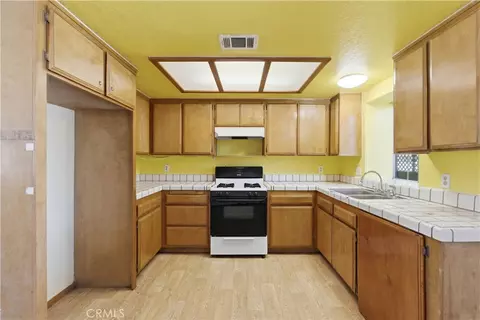 Kitchen - 12365 Waynoka Rd, Apple Valley, CA 92308 photo 2 of 3