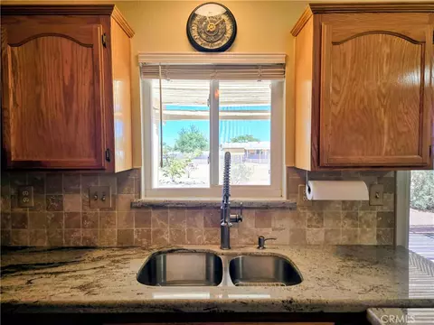 Kitchen - 10790 Jamul Rd, Apple Valley, CA 92308 photo 3 of 4
