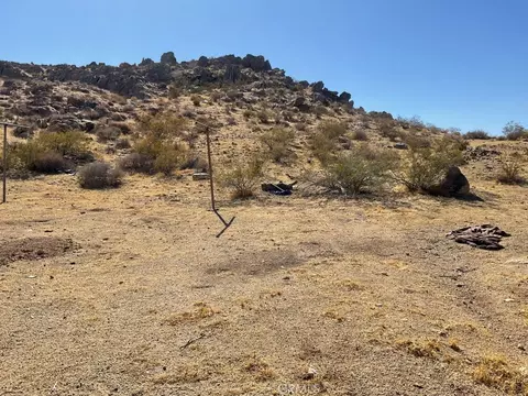 Exterior - 24335 Chuckawalla Rd, Apple Valley, CA 92307 photo 8 of 12