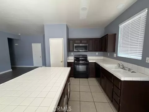 Kitchen - 13178 Pacific Ter, Victorville, CA 92392 photo 1 of 2