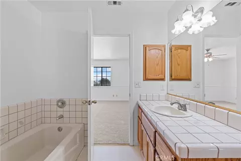 Bath - 4467 Valle Vista Ct, Phelan, CA 92371 photo 2 of 3