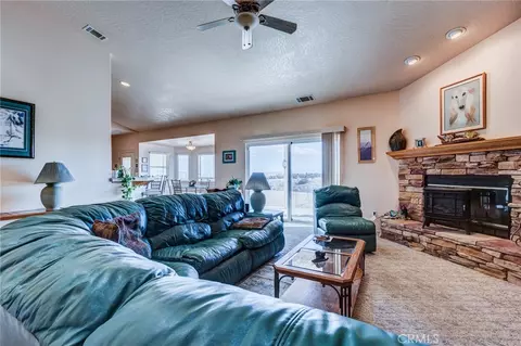Living - 8605 Cantel Ct, Oak Hills, CA 92344 photo 2 of 4