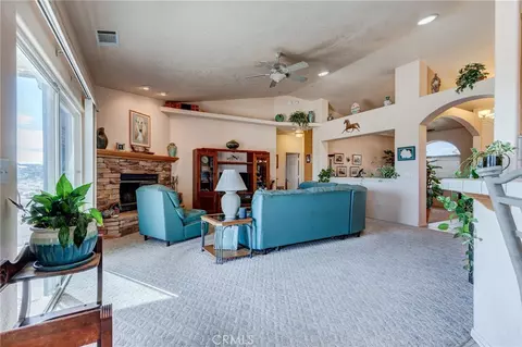 Living - 8605 Cantel Ct, Oak Hills, CA 92344 photo 4 of 4