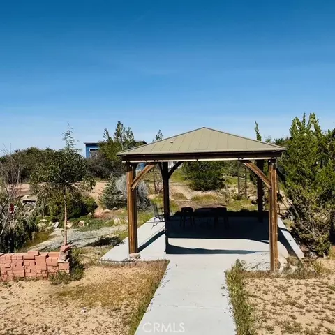 Exterior - 7438 Woodcliff, Phelan, CA 92371 photo 5 of 23
