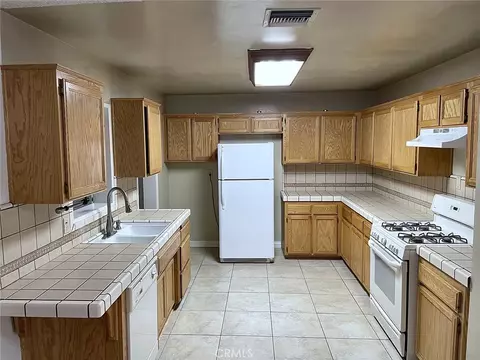 Kitchen - 14371 Jicarilla Rd, Apple Valley, CA 92307 photo 2 of 2