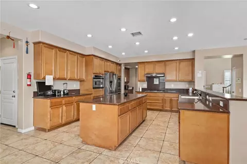 Kitchen - 13311 Kamelia St, Eastvale, CA 92880 photo 2 of 6