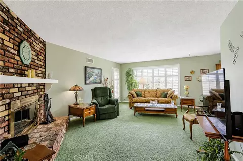 Living - 9371 Vernon Ave, Montclair, CA 91763 photo 3 of 3