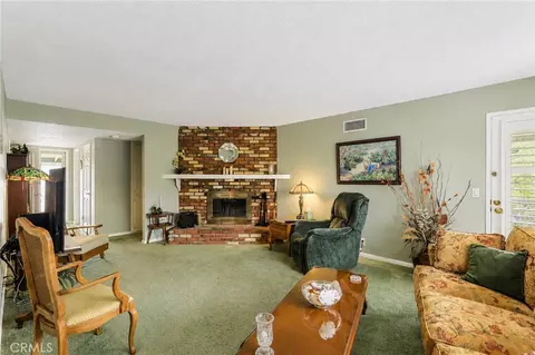 Living - 9371 Vernon Ave, Montclair, CA 91763 photo 2 of 3
