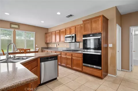 Kitchen - 13714 River Downs St, Eastvale, CA 92880 photo 3 of 4