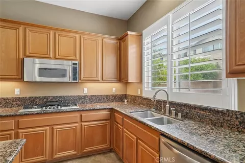 Kitchen - 15590 Syracuse Ln, Fontana, CA 92336 photo 2 of 3