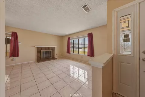 Living - 3148 Atlantic Ave, Highland, CA 92346 photo 4 of 10