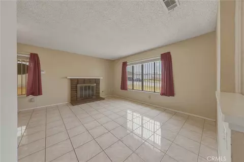 Living - 3148 Atlantic Ave, Highland, CA 92346 photo 2 of 9