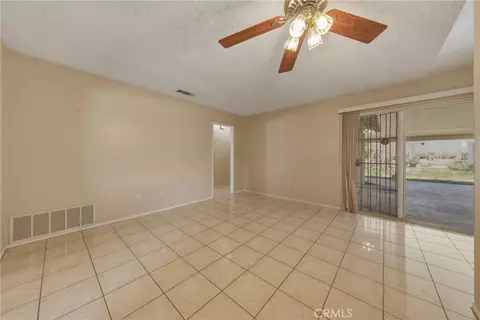 Living - 3148 Atlantic Ave, Highland, CA 92346 photo 9 of 10
