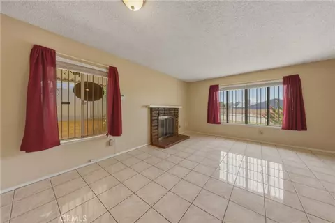Living - 3148 Atlantic Ave, Highland, CA 92346 photo 5 of 9