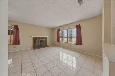 Living - 3148 Atlantic Ave, Highland, CA 92346 photo 3 of 10
