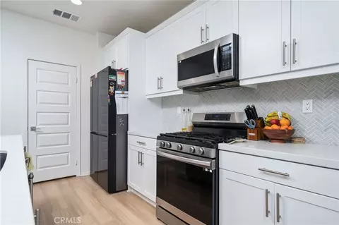Kitchen - 8730 Alturas Ave, Hesperia, CA 92344 photo 3 of 3