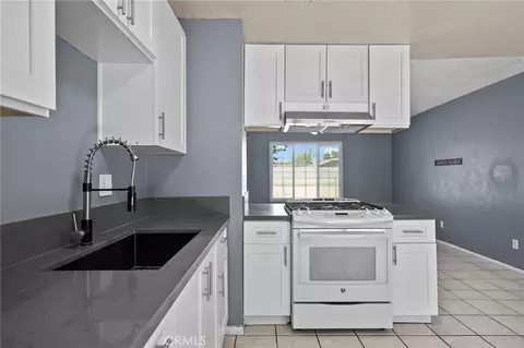 Kitchen - 9891 3rd Ave, Hesperia, CA 92345 photo 2 of 2