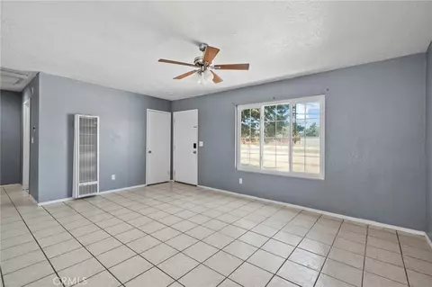 Living - 9891 3rd Ave, Hesperia, CA 92345 photo 3 of 3