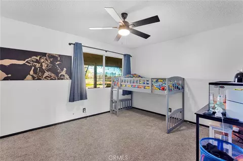 Bedroom - 14010 Jicarilla Rd, Apple Valley, CA 92307 photo 1 of 3