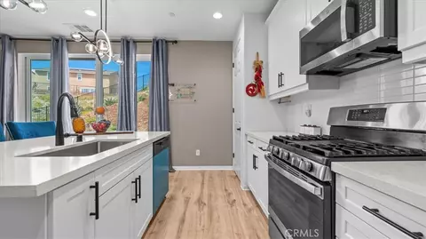 Kitchen - 35580 Roxy Rd, Beaumont, CA 92223 photo 2 of 3