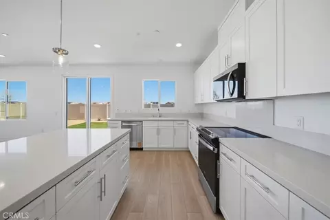 Kitchen - 3265 E Avenue J-4, Lancaster, CA 93535 photo 2 of 2