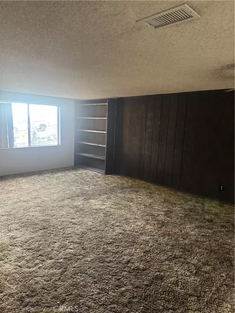 Living - 301 Maryknoll Dr, Colton, CA 92324 photo 10 of 15