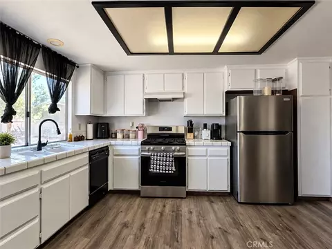 Kitchen - 7621 Alston Ave, Hesperia, CA 92345 photo 2 of 2
