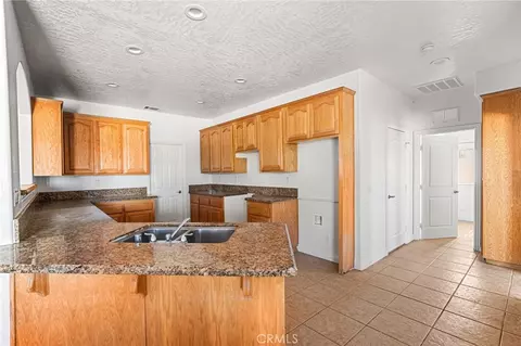 Kitchen - 8778 Smoke Tree, Phelan, CA 92371 photo 1 of 3