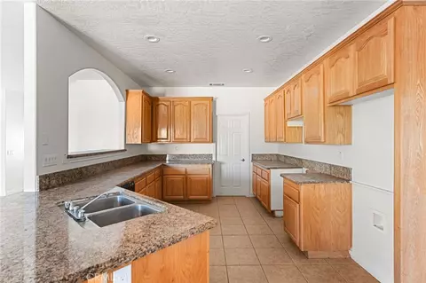 Kitchen - 8778 Smoke Tree, Phelan, CA 92371 photo 3 of 3