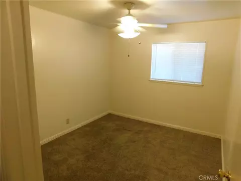 Bedroom - 1253 W 11th St, Merced, CA 95341 photo 4 of 15