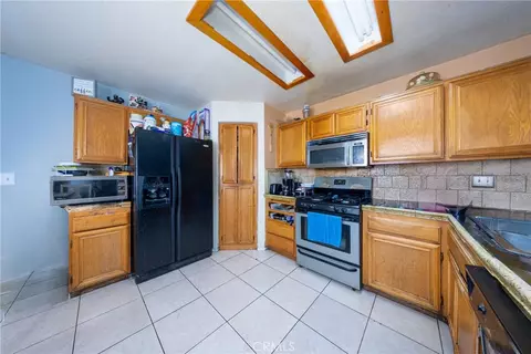 Kitchen - 14591 Monterey, Adelanto, CA 92301 photo 1 of 2