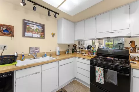 Kitchen - 6921 Quail Pl #E, Carlsbad, CA 92009 photo 2 of 3