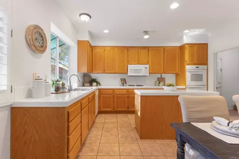 Kitchen - 1577 Whispering Palm Dr, Oceanside, CA 92056 photo 2 of 3