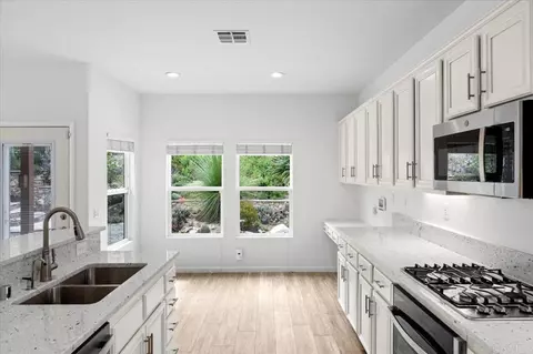 Kitchen - 3173 Willow Tree Ln, Escondido, CA 92027 photo 2 of 2